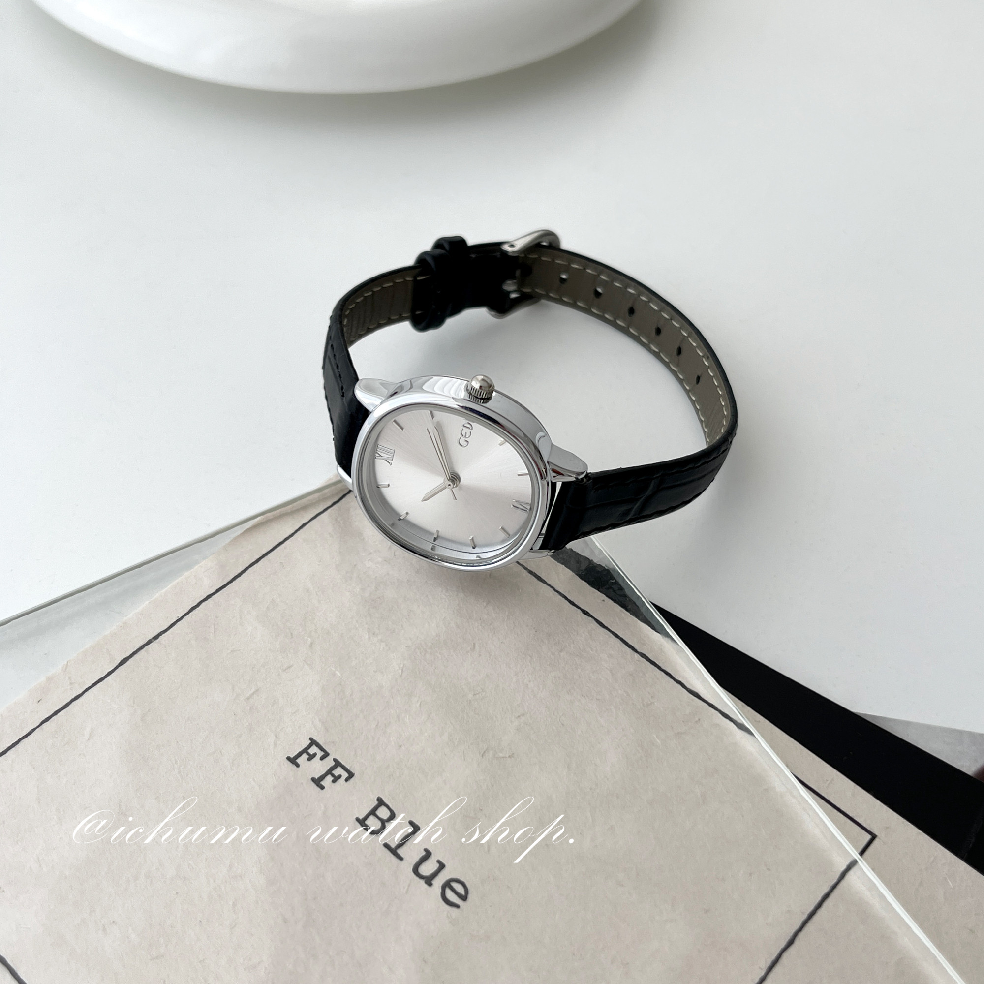 歌迪简约气质高级感圆形皮带女表