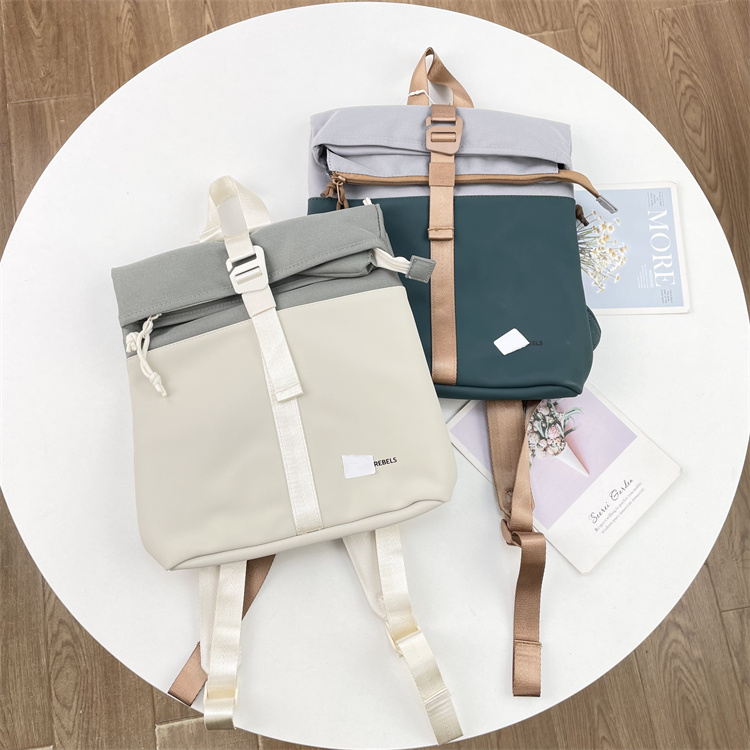 H1美国外单~26新款时尚撞色拼接双肩包女大容量百搭休闲背包书包