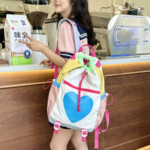 多巴胺抽绳书包女中小大学生ins爱心撞色双肩包2024轻便出游背包