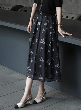 轻熟风黑色优雅印花半身裙女2025夏季新款压褶时尚灵动感A字伞裙
