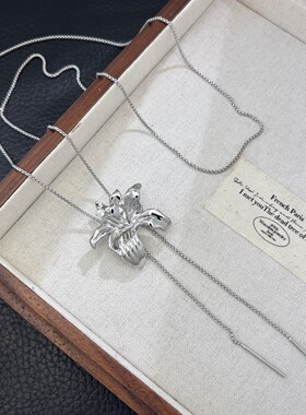 丽银秋冬新款高级感流苏设计鸢尾花毛衣链气质时尚轻奢抽拉项链女