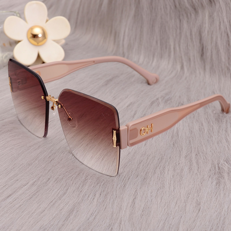 2026新款女士个性字母尼龙太阳镜复古无框修脸墨镜韩版驾驶镜粉色