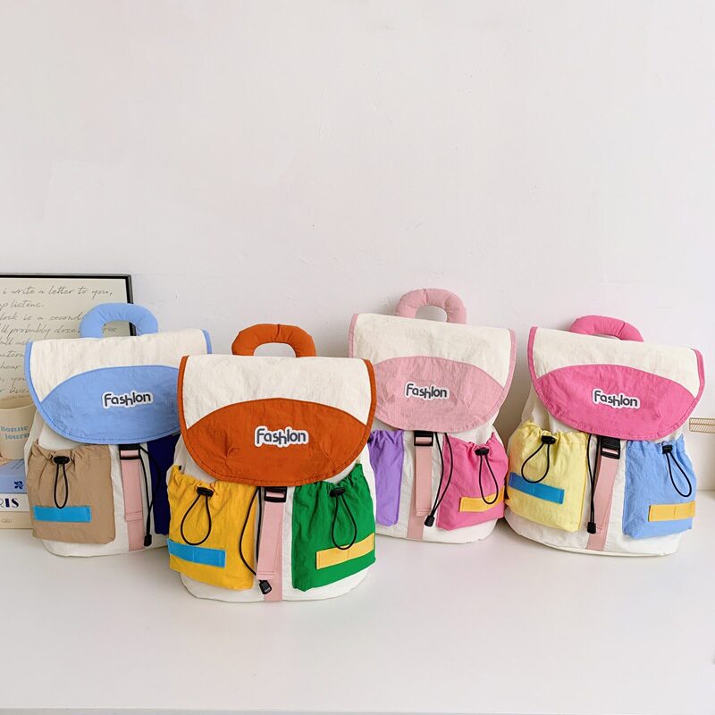 新款时尚撞色男女童双肩包高颜值小学生书包韩版洋气抽绳儿童背包