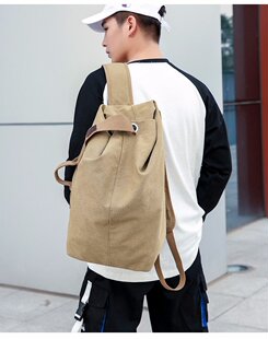 大号双肩背包圆形男式简约帆布抽带包旅游大容量背包校园学生书包