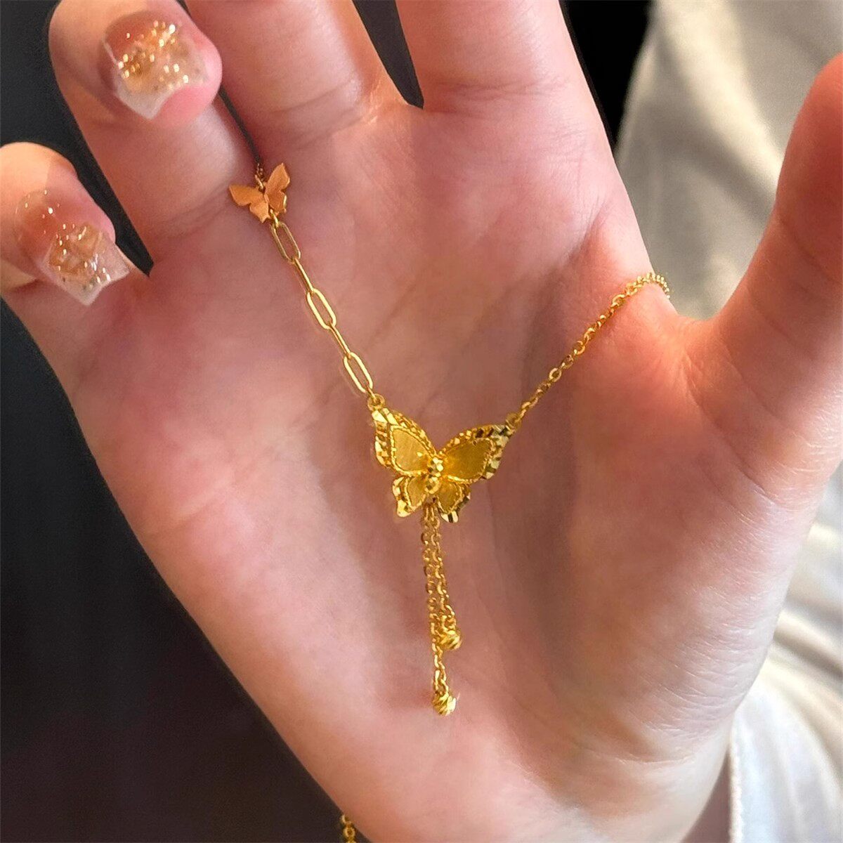 爆闪花蝶梦流苏蝴蝶项链女黄金色转运珠碎金子小众设计锁骨链送礼