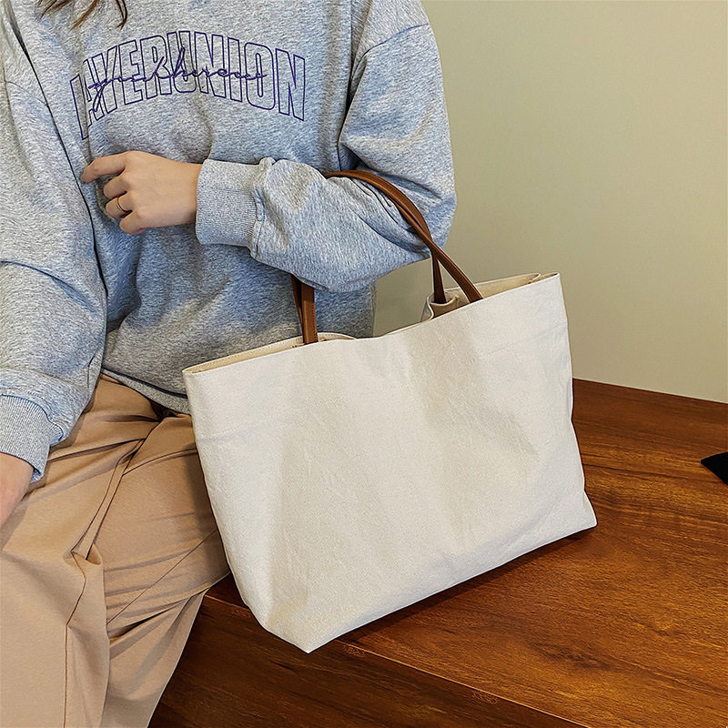 日本ぜいた新款帆布托特包女2026新款潮女士外出单肩斜挎托特包