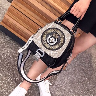 日本ぜいた超火烫钻双肩包女2026新款时尚潮流女士背包高级感真皮