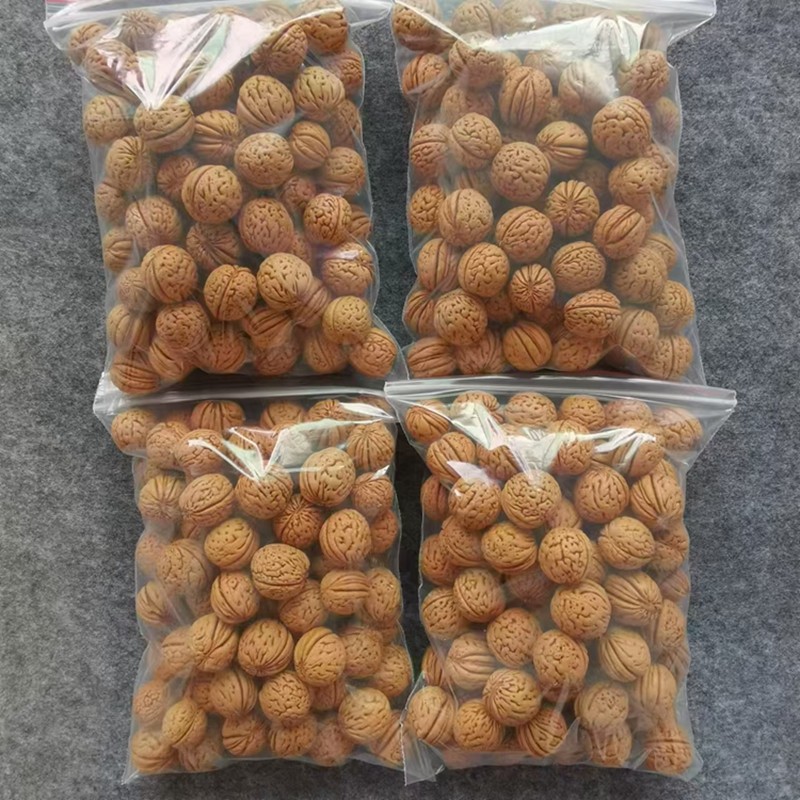 野生桃核雕刻原籽原料厚皮核成熟好颗颗沉水大尺寸光珠加工精品料图片