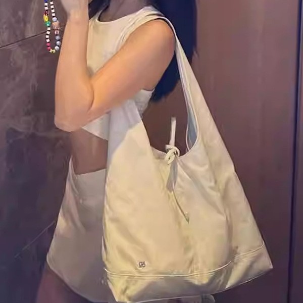 韩版小众女包dp慵懒风法系蝴蝶结包大容量网红百搭单肩腋下托特包