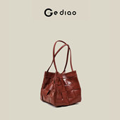 格调studio轻奢真皮编织女包2025冬季 水桶包高级感小众手提单肩包