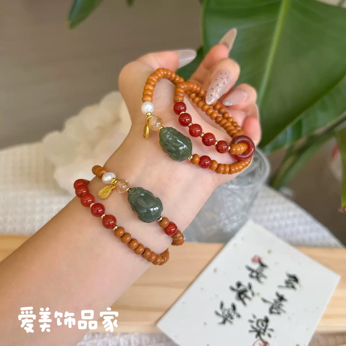 爱美饰品家2025新款貔貅手串手链新中式天然橄榄壳貔貅手链转运珠