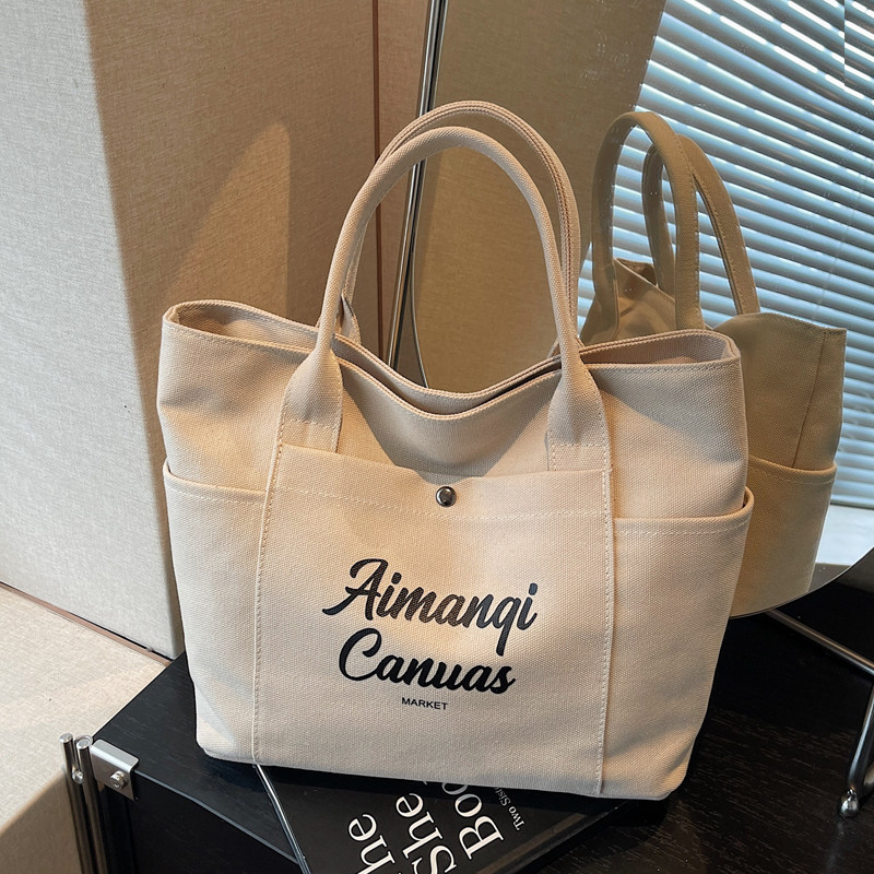 2025新款时尚潮流简约大容量托特包高级感单肩包女士帆布包休闲包