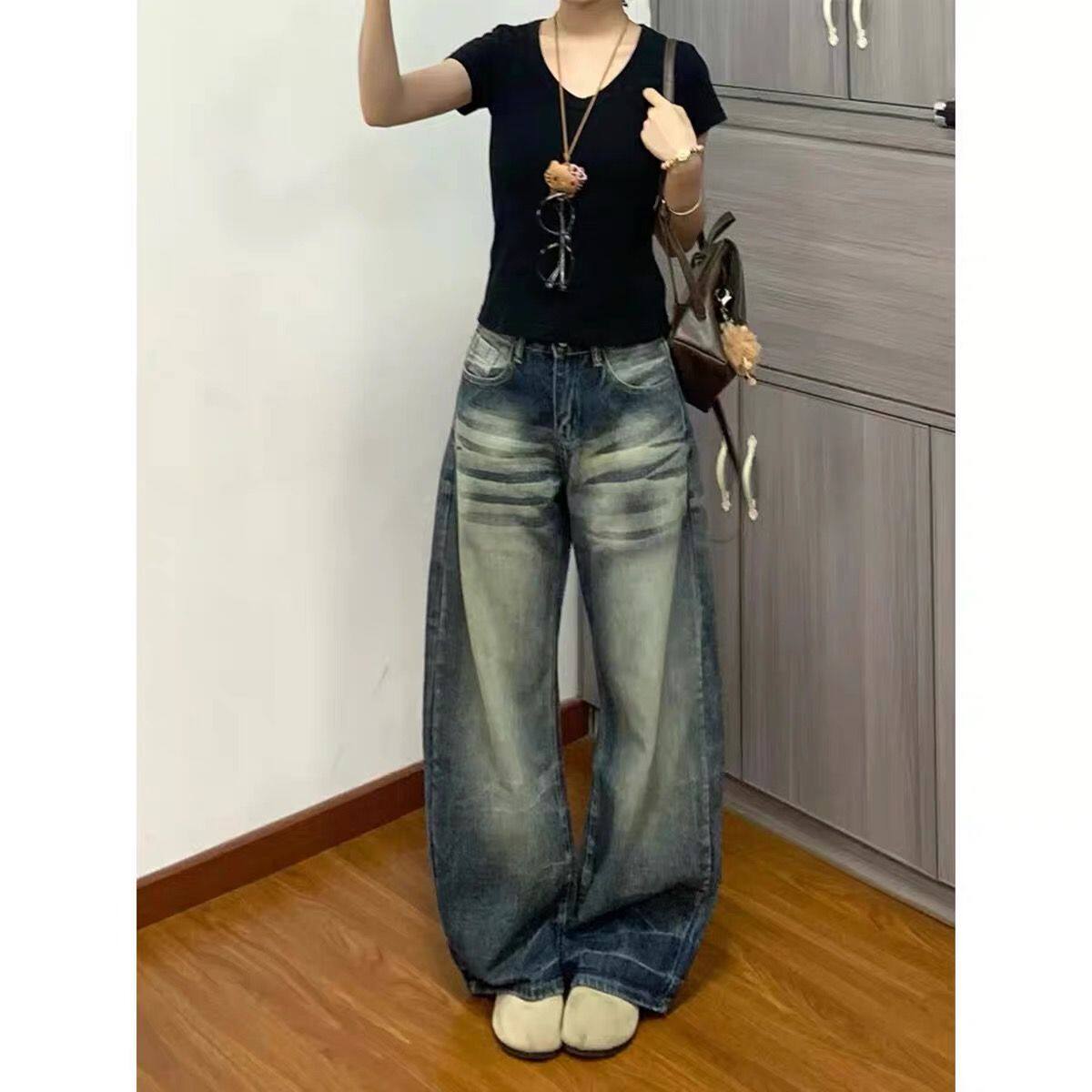 韩版辣妹显瘦百搭弯刀牛仔长裤女