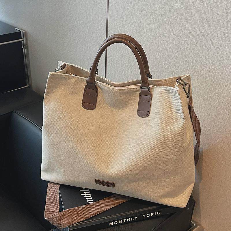 休闲帆布包包女式2025新款大学生上课通勤托特包大容量斜挎手拎包,箱包皮具/热销女包/男包,托特包,淘宝优惠券,粉丝福利购,淘宝优惠卷