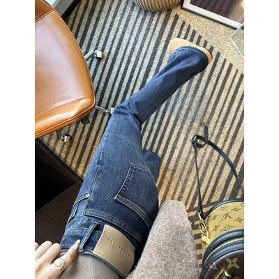 秋冬植绒微喇叭牛仔裤