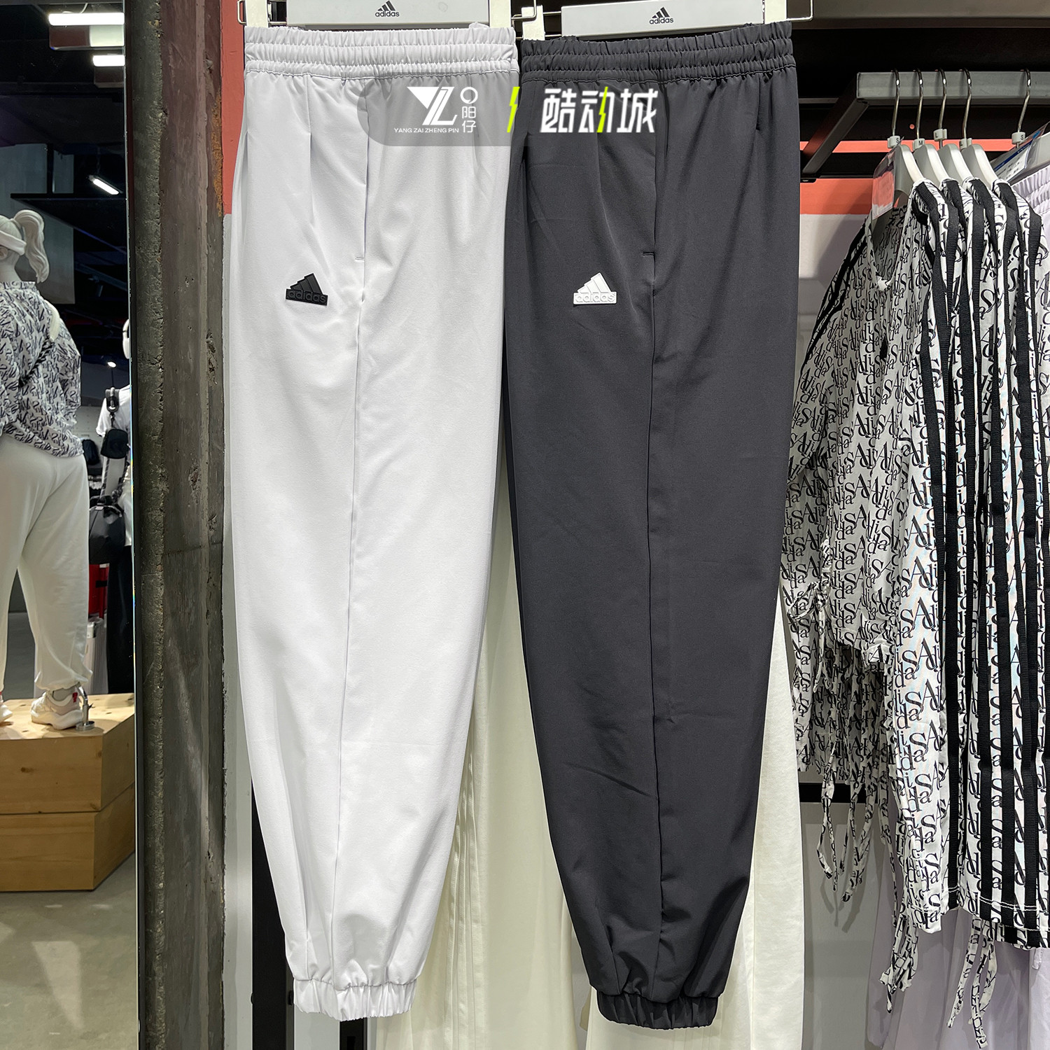 阿迪达斯女卫裤运动休闲束脚长裤