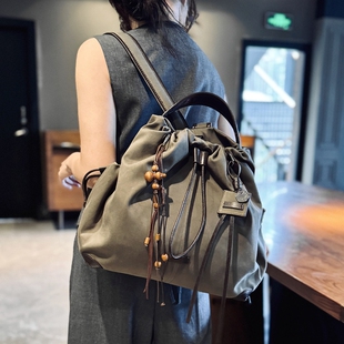 高品质女包时尚潮流旅行轻便双肩包2025新款真皮帆布背包牛皮书包
