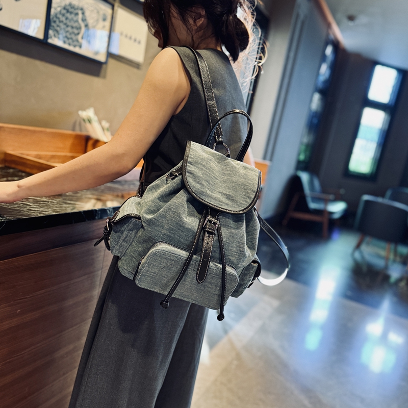 2025年新款真皮帆布双肩背包