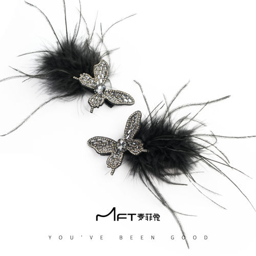 黑色羽毛蝴蝶鸭嘴夹发饰