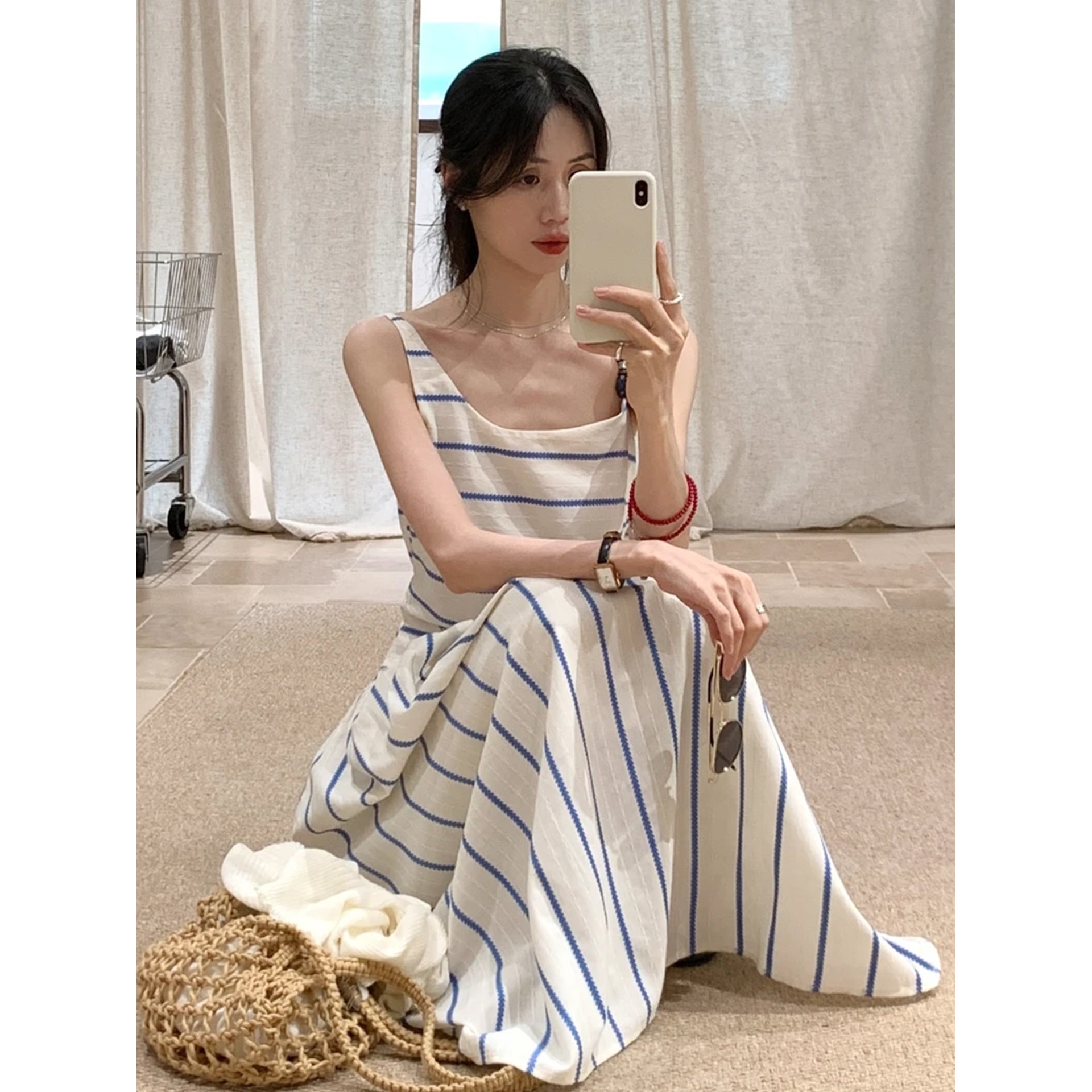 海边度假蓝色条纹吊带连衣裙子女夏季2025新款巨好看法式气质长裙