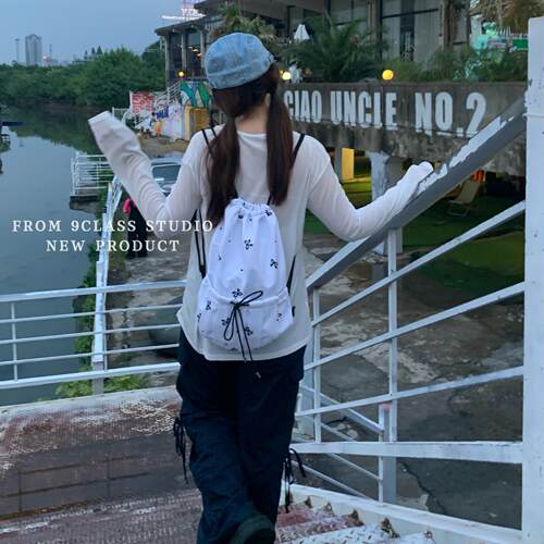 9class白色甜美蝴蝶结印花双肩包