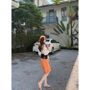 张羞羞  LaLaLand/雪纺碎花鱼尾春季橘色半身裙短裙2026新款