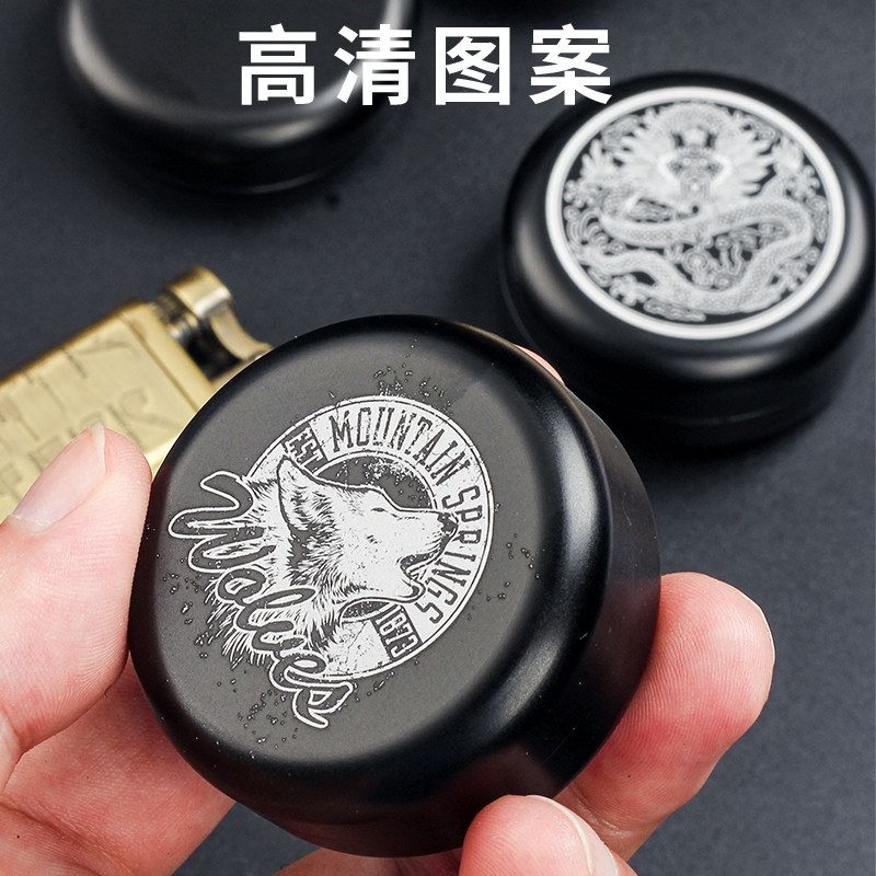 黑色圆形铝合金装草烟的盒子