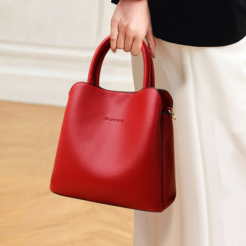 香港真皮包包女2025新款小水桶包女士妈妈手提包单肩包百搭斜挎包