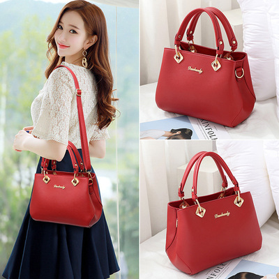 香港真皮女包包2025新款手提包女韩版简约斜挎包中年妈妈包单肩包