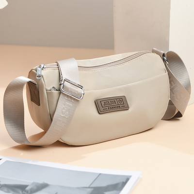 夏天女款包包轻便斜挎包小型原创小众百搭小布包尼龙牛津布饺子包