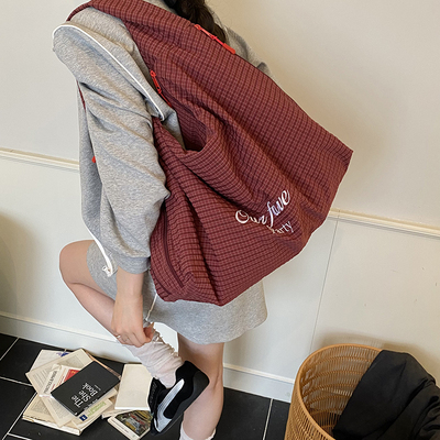 红色帆布包女2025新款大容量慵懒松弛感通勤包学生党旅行托特包夏
