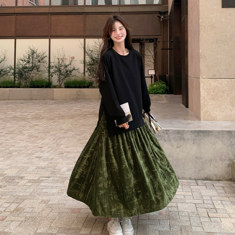 黑拼绿色不规则连衣裙女2025年春季新款设计感学院风流苏过膝长裙图片