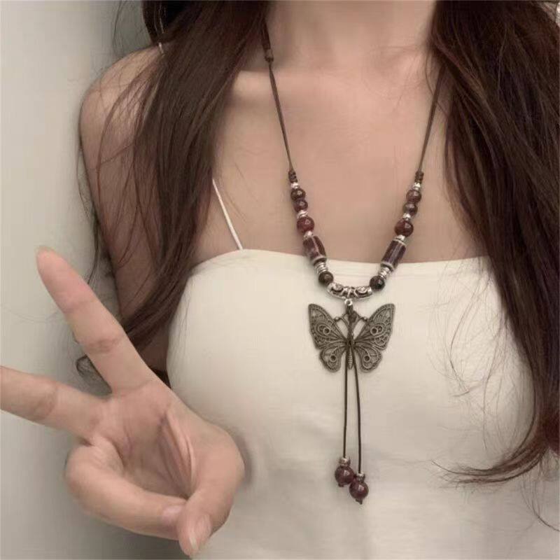 复古民族风陶瓷蝴蝶铃铛吊坠项链女新款潮长款毛衣链配饰品