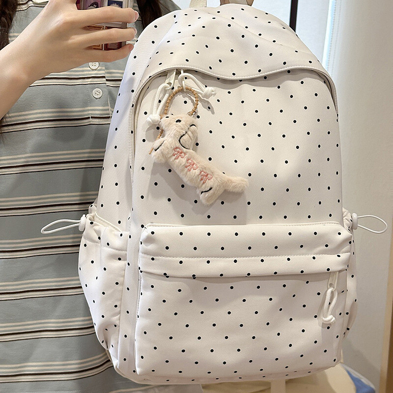 白底小波点双肩包女ins可爱腊肠狗挂件轻便大容量初高中学生书包