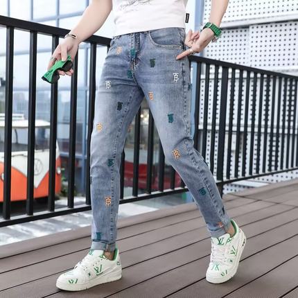 高端刺绣牛仔裤男春秋新款潮牌修身小脚印花直筒弹力百搭破洞裤子