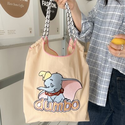 Disney迪士尼官方正品刺绣笨宝小飞象环保袋帆布斜挎购物袋通勤包