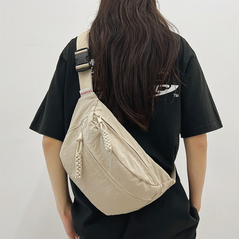 斜挎包女2025新款骑行运动胸包女款休闲百搭帆布饺子包挎包腰包男