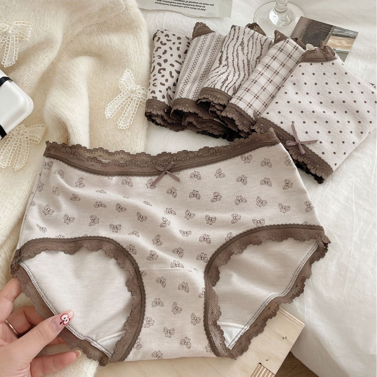 秋冬羊绒触感狂野豹纹保暖磨毛少女内裤蕾丝边中腰包臀三角裤棉裆