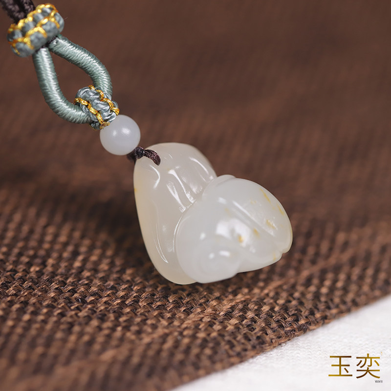 玉奕和田白玉籽料洒金皮蜗牛挂件
