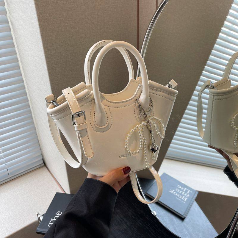 小众洋气时尚水桶包包新款高级感2025百搭手提包简约单肩斜挎包,箱包皮具/热销女包/男包,水桶包,淘宝优惠券,粉丝福利购,淘宝优惠卷