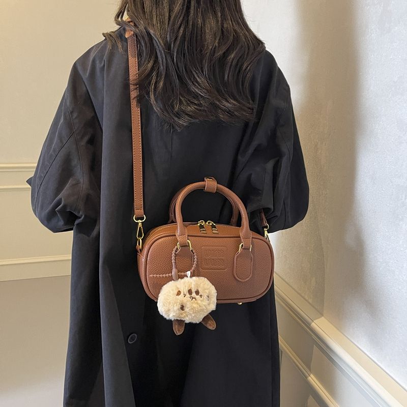 小众保龄球女包2026洋气甜美复古质感手提小方包多功能单肩斜挎包