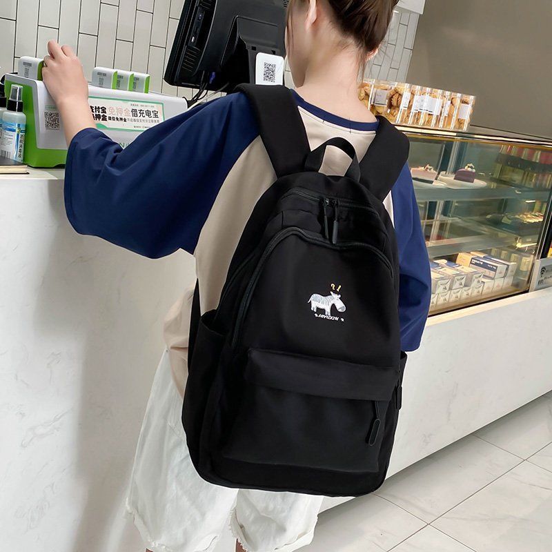 网红书包小学生三至六年级女童男双肩背包