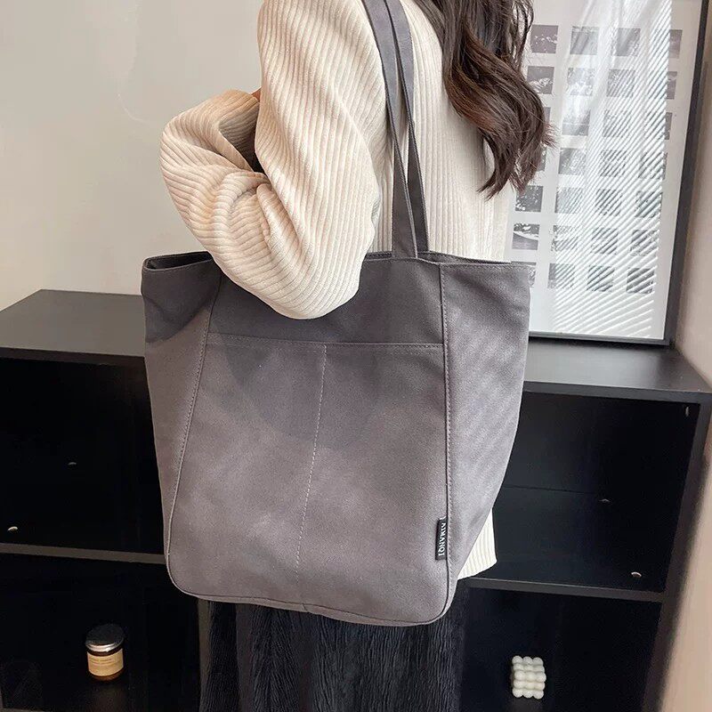 包包通勤女生轻便大容量休闲简约风单肩包女大学生上课通勤帆布包