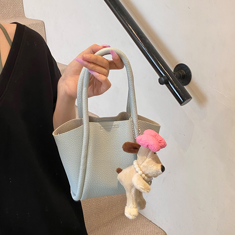 小众手提菜篮子包包女2025新款荔枝纹单肩子母包高级感斜跨水桶包