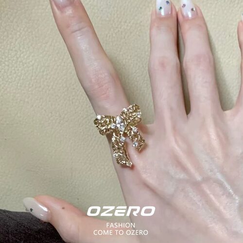咖金色镂空闪钻蝴蝶结戒指女