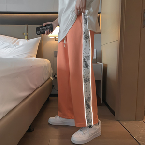 新款男女中性休闲裤反光条纹直筒透气哈伦卫裤运动裤九分裤图片