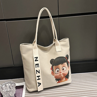 哪吒周边帆布包魔童闹海大容量可爱手提单肩包学生上课书包补习袋
