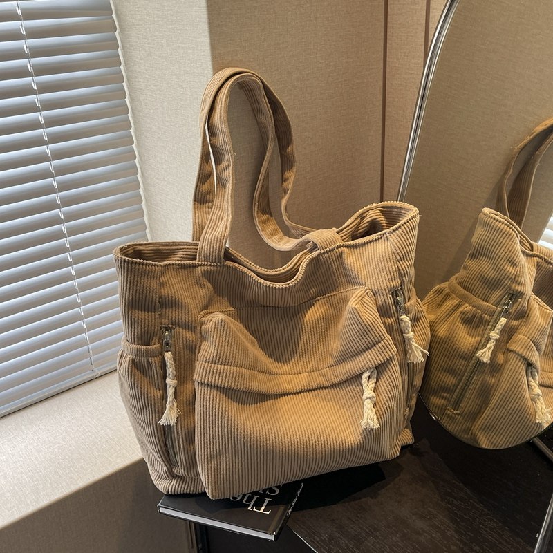 条绒帆布大包包女2025新款复古大容量单肩包女生通勤包手提托特包,箱包皮具/热销女包/男包,托特包,淘宝优惠券,粉丝福利购,淘宝优惠卷