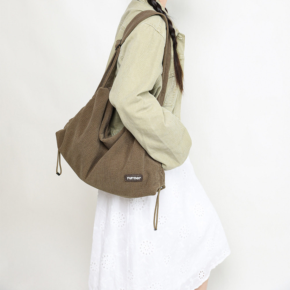 sport包包四季高级感小众通勤女式包ins帆布包大容量饺子包斜挎包