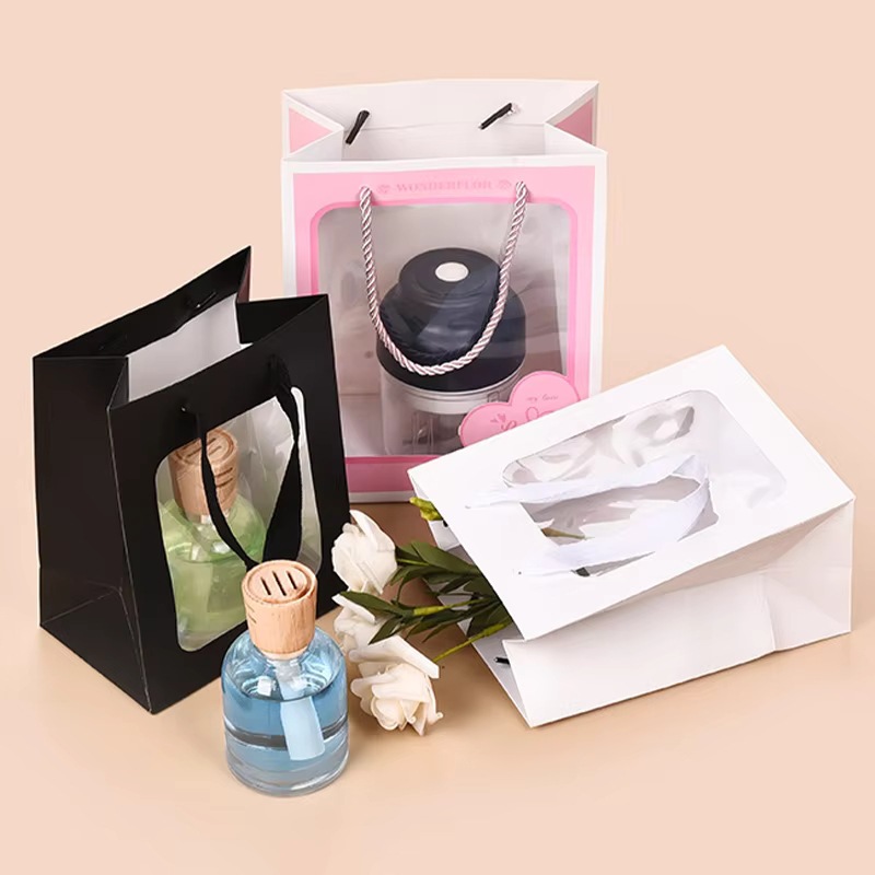 纸袋定制手提袋购物袋热卖礼品纸袋透明窗口矩形层压压花丝带酒杯